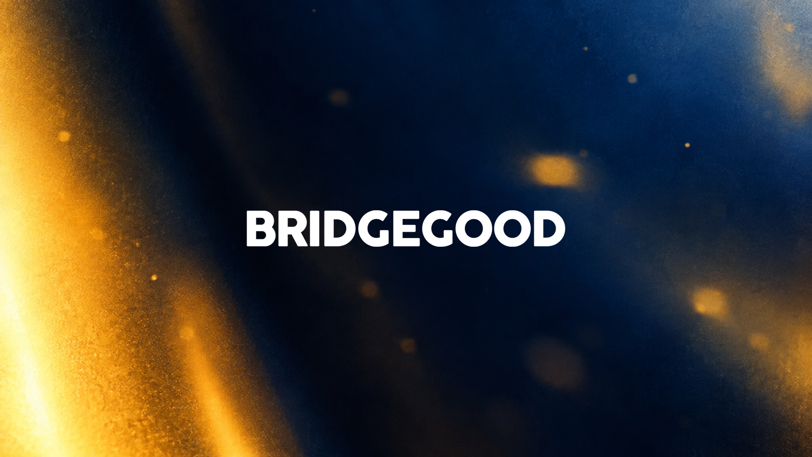 BRIDGEGOOD wordmark in white on deep navy, with soft gold light flares